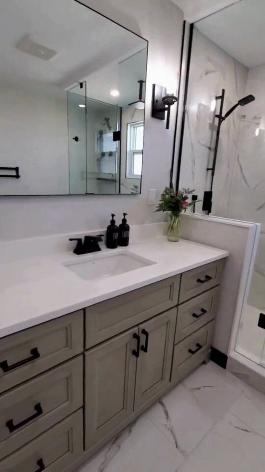 How would you rate this makeover? ✨️

Watch as our timeless bathroom vanity adds elegance to this incredible before and after transformation.

Beautiful work done by @interiorsbyabby 

#bathroomhacks #bathroomtransformation #bathroomdesign #bathroomrenovation #stonewoodbathcabinetry